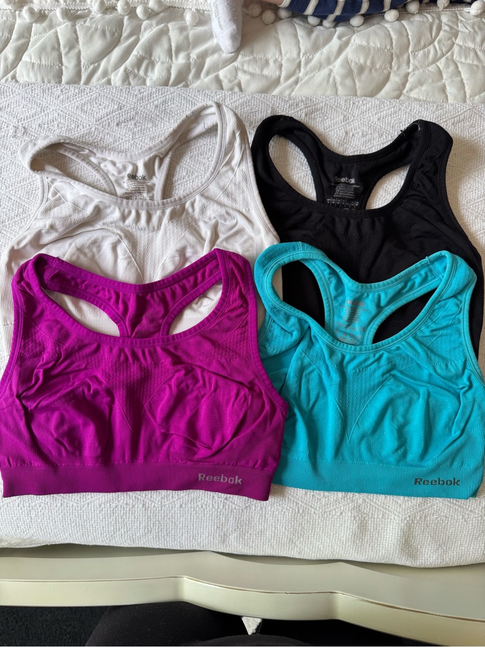 Reebok Sports Bra Pack in White, Black, Fuchsia, Teal